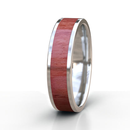 Silver ring with a wood inlay on a white background