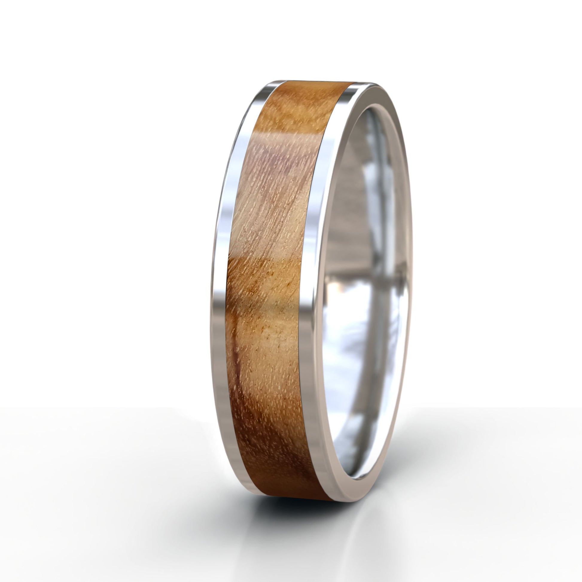Silver ring with wooden inlay on a white background