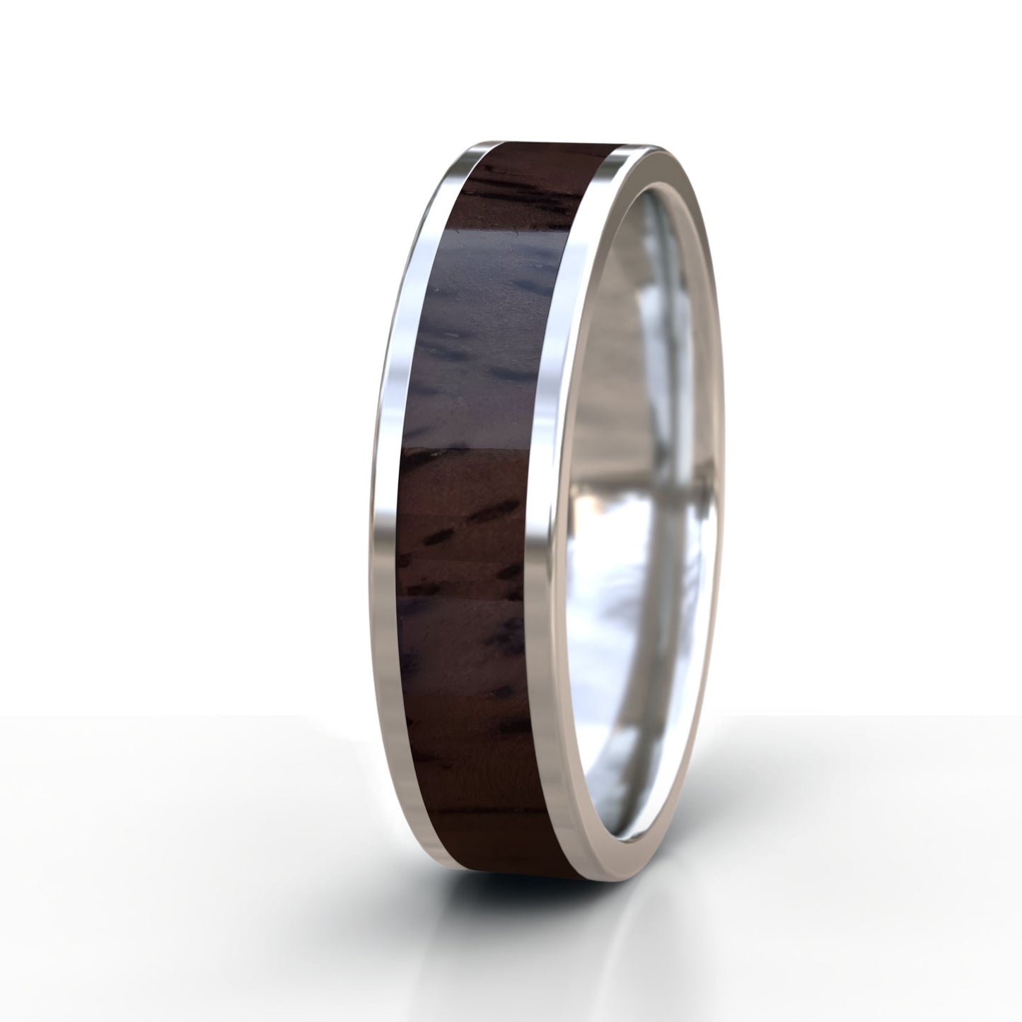 Silver ring with wooden inlay on a white background
