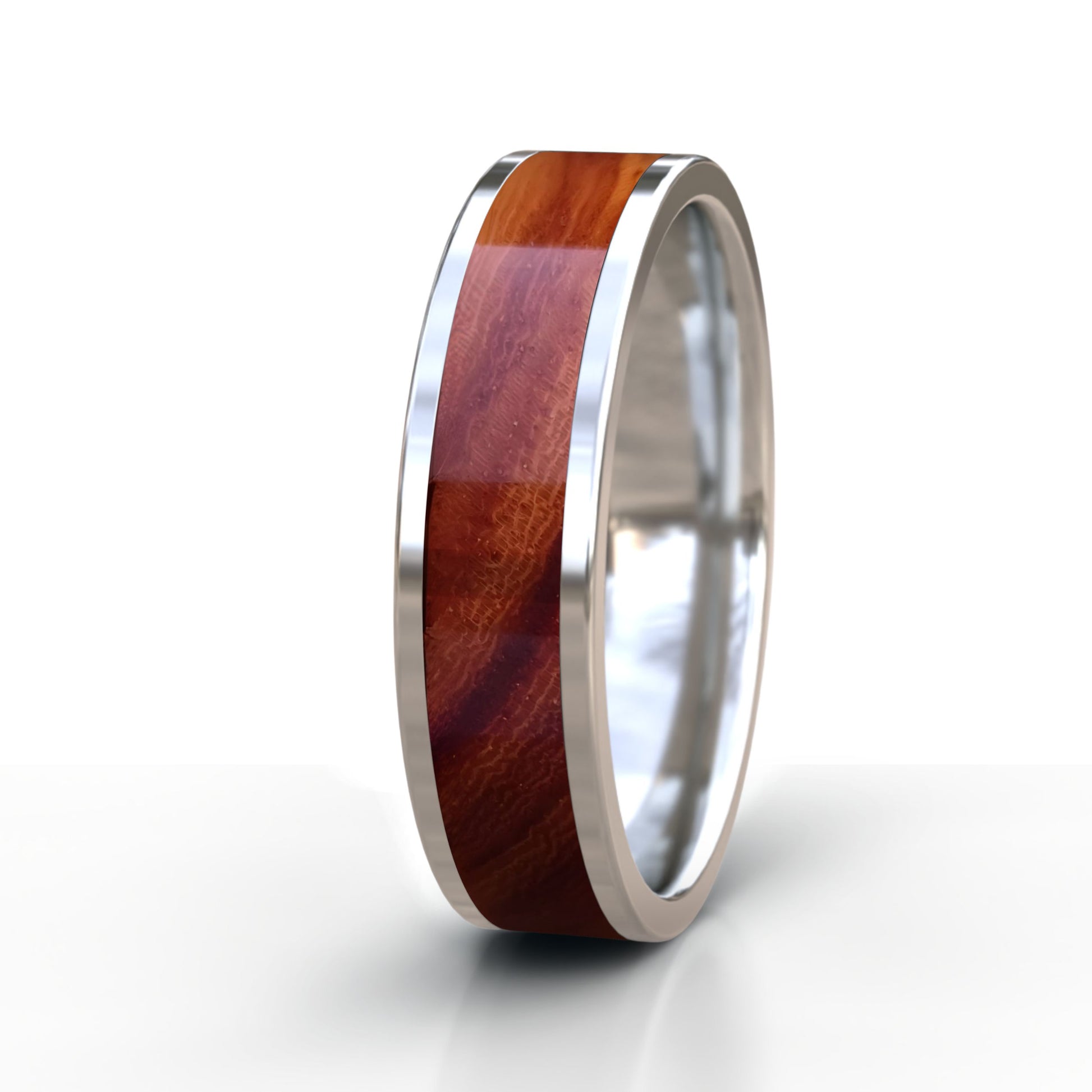 Silver ring with a wood inlay on a white background