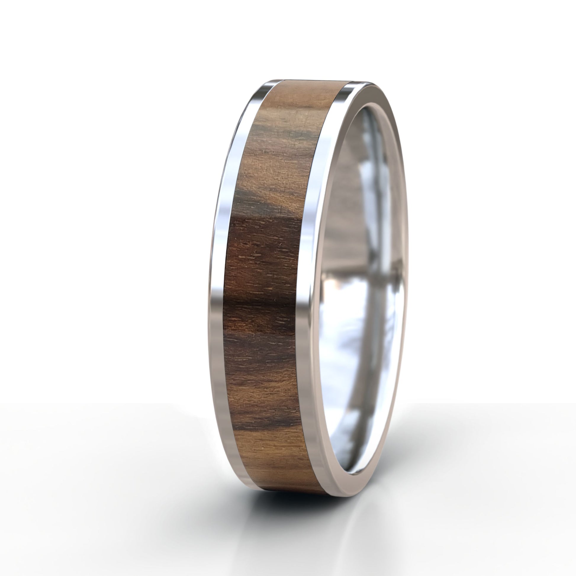 Silver ring with wooden inlay on a white background