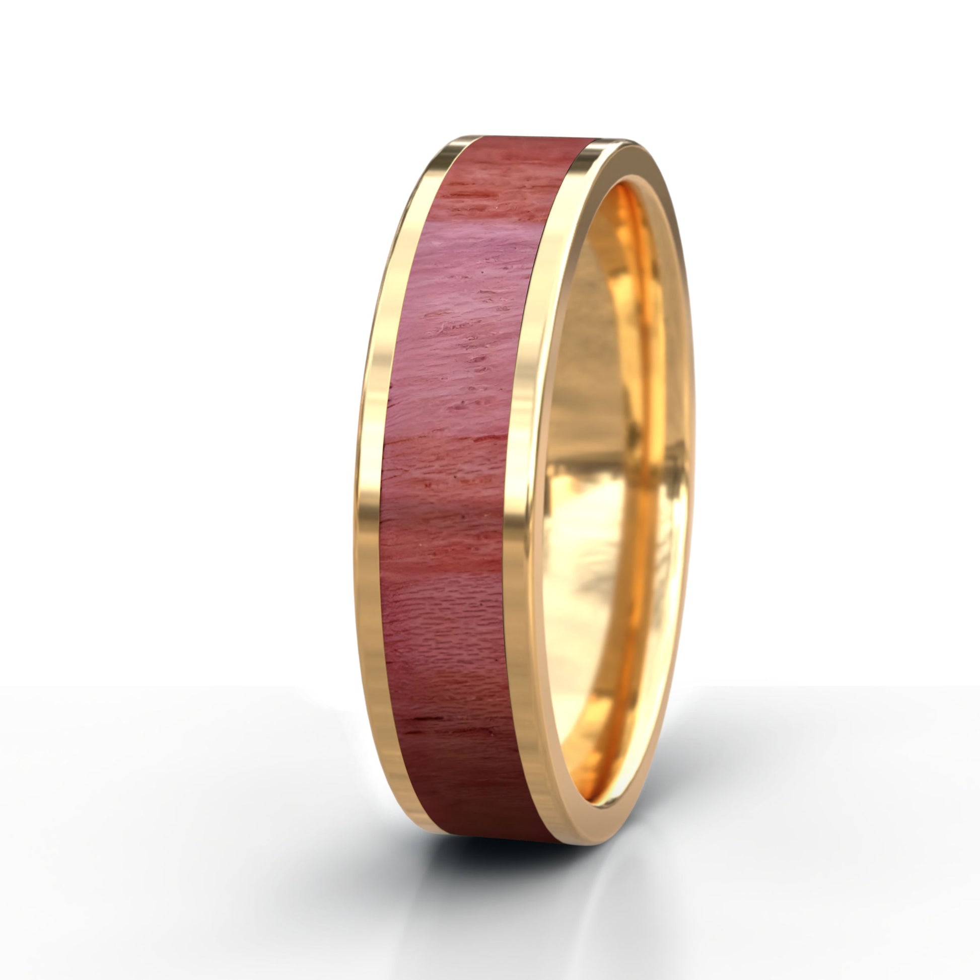 Gold ring with a wooden inlay on a white background