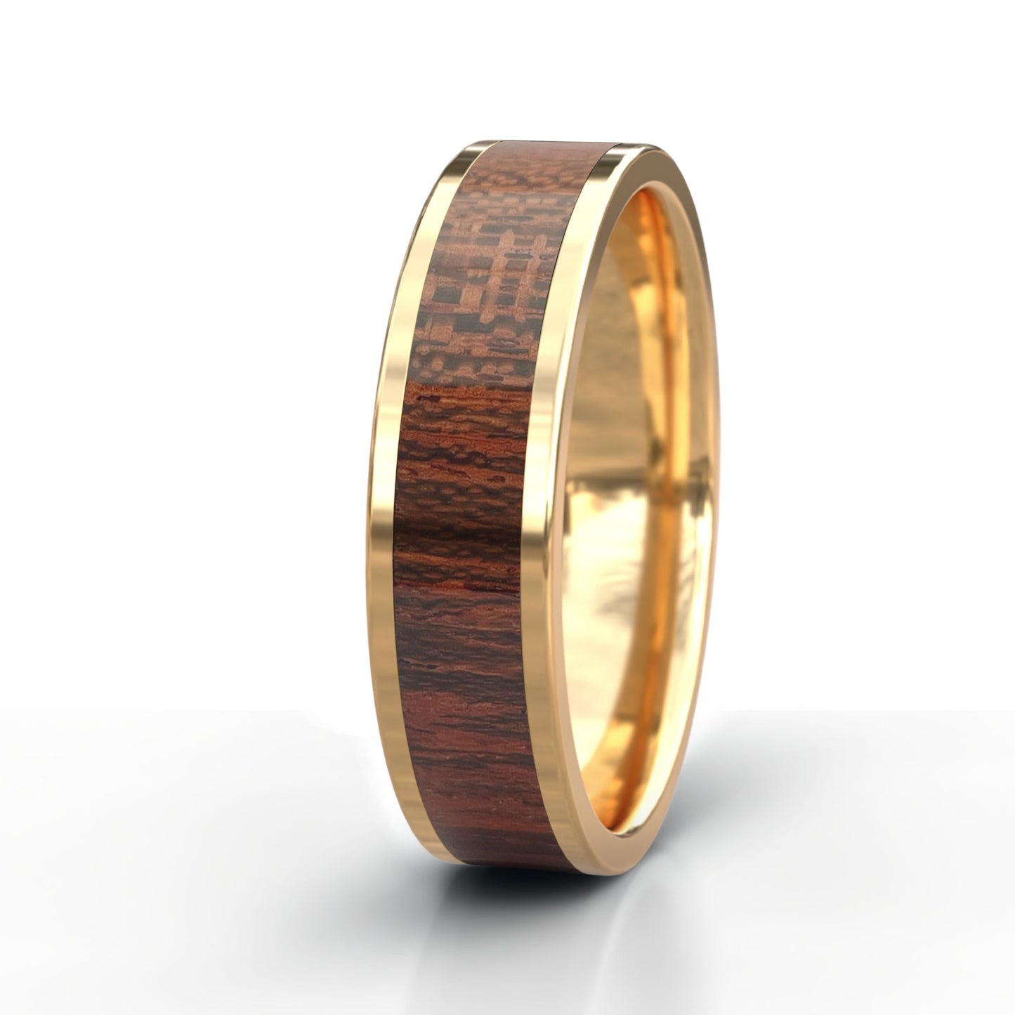 Gold ring with wooden inlay on a white background