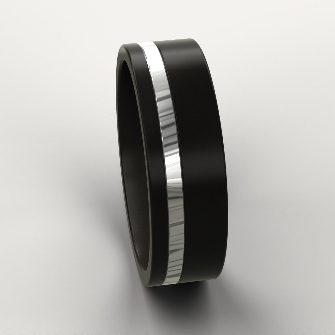Black Zirconium Men's Ring with a Damascus line inlay on a light grey background
