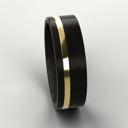 Black ring with a gold stripe on a light gray background
