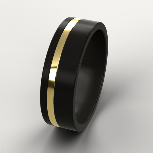 Black ring with a gold stripe on a gray background