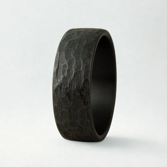 Black textured ring on a white background