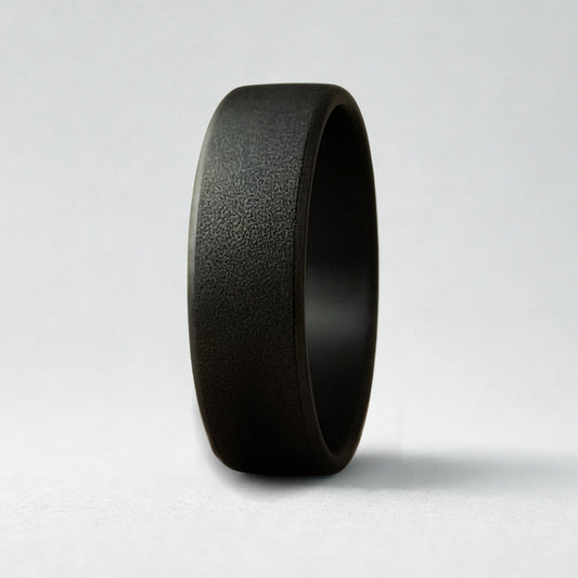 A textured black ring on a white background
