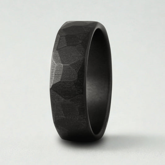 A black textured ring on a white background