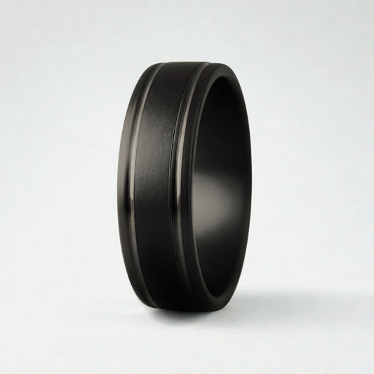 A black ring with two grooves on a white background